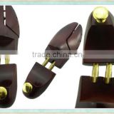 red wooden shoe tree/footwear stretching/toe stretcher
