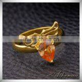 China Imported Jewelry Smooth Metal Angle Wing Red Zircon Gold Engagement Ring thumbnail-3