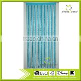 Hanging bead curtain with blue ribbons