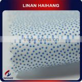 China manufacturer spunlace raw material plastic dots nonwoven fabric