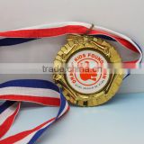 Gold simply metal medaille with ribbon