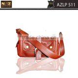 Sling Bag / Travel Bag in Genuine Brown Leather With Essential Pockets.