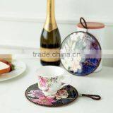 Hot Sell Round Shape Ceramic Trivet With Rope for Hanging