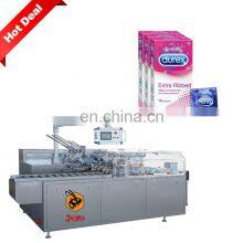 Автоматическая машина для упаковки презервативов в коробки. Машина для упаковки презервативов в коробки