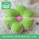 green print flower cushions