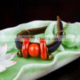 Retro Chinese Red Handmade Leather Ceramic Bead Bracelet With Bell on it thumbnail-4