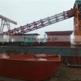 Wet sand or dryland bucket chain gold dredger especially in water