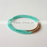blue green seed bead bracelet with gold tube