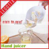 Plastic Material Food Grade Cheap Simple Creative Orange Squeezer Wholesale thumbnail-3