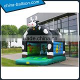 Bouncy castle in the shape of a friendly cow