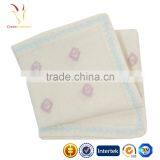 Baby Romper Set With Intarsia Flowers Matching Baby Knit Beanie and Intarsia Knit Blanket thumbnail-3