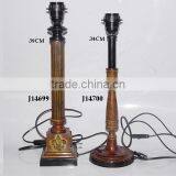 brass lamps with fleur de lily pattern and patina finish