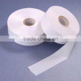 Side cutting polyester satin for care label garment label