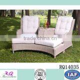 Rattan Loveseat and Footrest With Cushion thumbnail-1