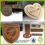2015 New Design Double Sided Custom Embossed Real Leather Badges thumbnail-2