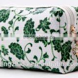 Blue and White Diamond Pattern Cosmetic Bag in Hand thumbnail-2