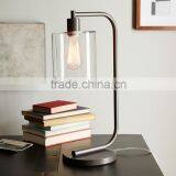 11.23-7 Glass and Steel Find a New Focal Point Lens Table Lamp Inspired by Factory Lighting thumbnail-1
