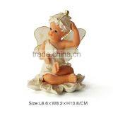 Polyresin Smiling Sitting Angel Figurine thumbnail-3