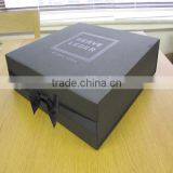 Black Texture Paper Suit Box With Silver Logo and Black Ribbion