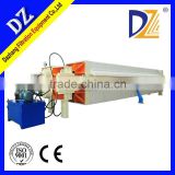 Low moisture hydraulic kaolin filter press