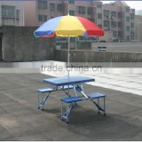 Portable blue plastic folding table and chairs