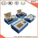 CO2 Mini Laser Engraving & Cutting Machine 250*250mm/300*300mm With Honey Comb Working Table Infrared Positioning System ZK-2525