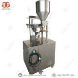 Автомат для упаковки миндаля в подносящиеся пакеты. Автомат для упаковки жареных орехов.