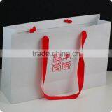 Competitive price latest shopping paper bag with paper handle