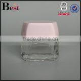 China Cosmetics 50 ml Glass Jar Clear Transparent Square Glass Jar With Pink Cap Manufacture thumbnail-2
