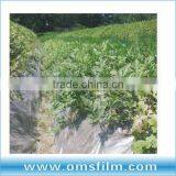 Agricultural perforated row cover