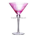 Martini glass with pink spraying and hand cutting.