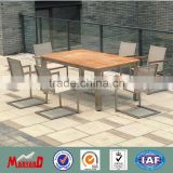 Teak and stainless steel dining table