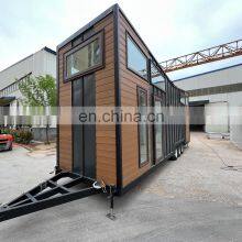 Steel Prefab Tiny Caravan Trailer House Factory Direct Made in China thumbnail-1
