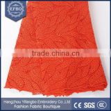 Latest pure color orange african lace china supplier cheap stocklot lace rhinestone decoration glittering guipure lace fabric