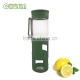 best selling glass drink bottle with food grade silicone sleeve and straw