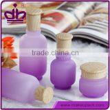 Imitation wood-grain cap purple glass hair serum bottle