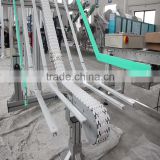Vertical bottle clamping conveyors system