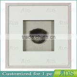 Solid Wood Shadow Box Frames With A Light Gray Wash and Encasing Slabs Of Colorful Agate Stone Under Glass
