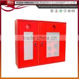 red metal cabinet for fire extinguisher and hose