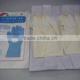 Textured latex surgical gloves