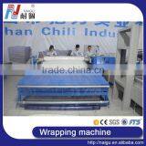 China Foshan NaiGu Manufacturer Semi-automatic Mattress Roll Packing Machine thumbnail-1