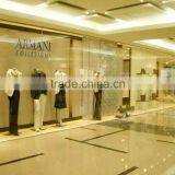 Most elegant lines and simple color custom clothing store display design