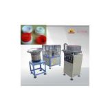 Edibly oil cap assembly machine