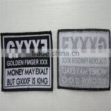 High Quality Black Black Background White Logo Merrow Border Woven Label thumbnail-1