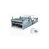 Rewind and slitting machinery for non-woven