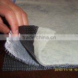 KNITTED COMPOSITE GEOMEMBRANE