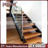 Interior Wood Stairs With Wood Stair Treads and Glass Railing