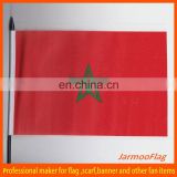 stick waving morocco hand flag