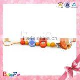 2015 New Design Wood Bead Fashion Cute Baby Pacifier Clip
