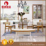 Modern wooden high glossy white and teak color round functional dining table and dining chair in dining room sets